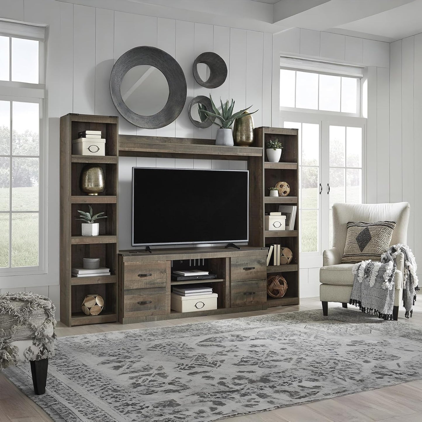 Signature Design by Ashley Trinell Rustic 4-Piece Entertainment Center for TVs up to 69", Light Brown