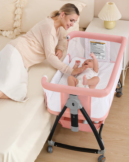 Bedside Bassinet for Baby, 3 in 1 Breathable Mesh Baby Bassinet, 6 Height Adjustable, Easy to Fold, Bassinet Bedside Sleeper with Wheels, Mosquito Net, Storage Basket, Rocking Bassinet for Baby, Pink
