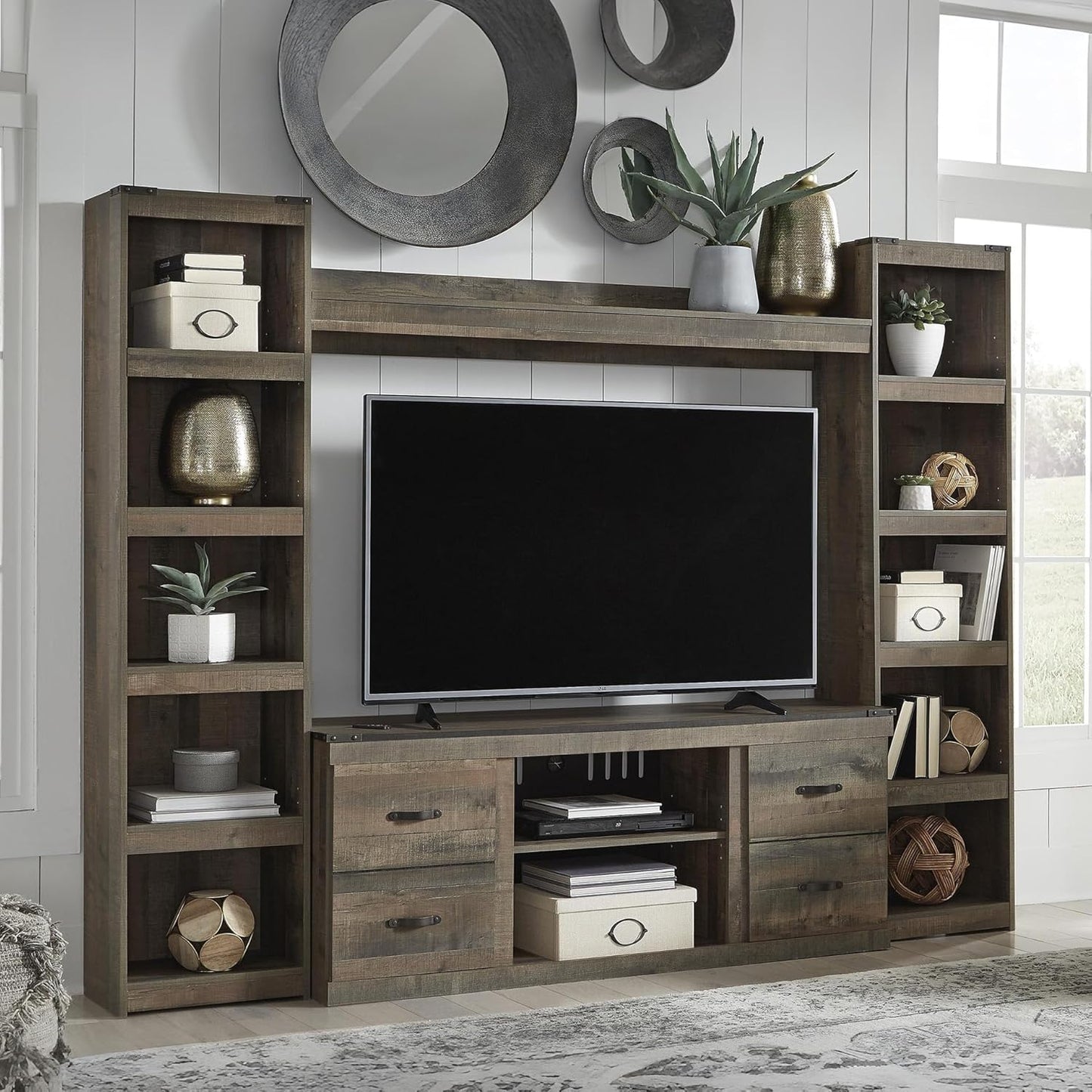 Signature Design by Ashley Trinell Rustic 4-Piece Entertainment Center for TVs up to 69", Light Brown