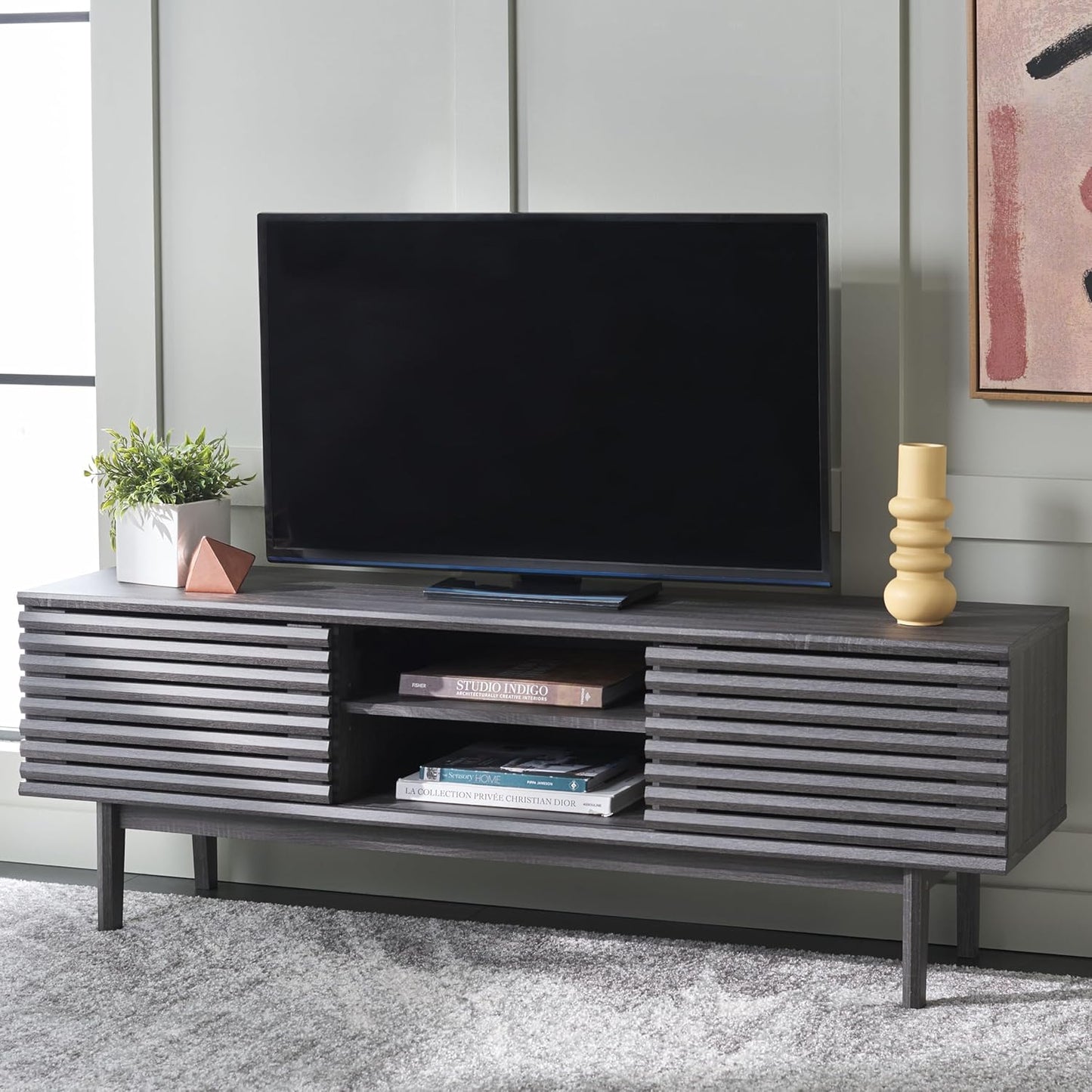 SAFAVIEH Aricia TV Stand for up to 65" Flatscreen – Distressed Black, 2 Sliding Doors with Interior Storage, 1 Open Shelf, Entertainment Media Console (MED9633E)